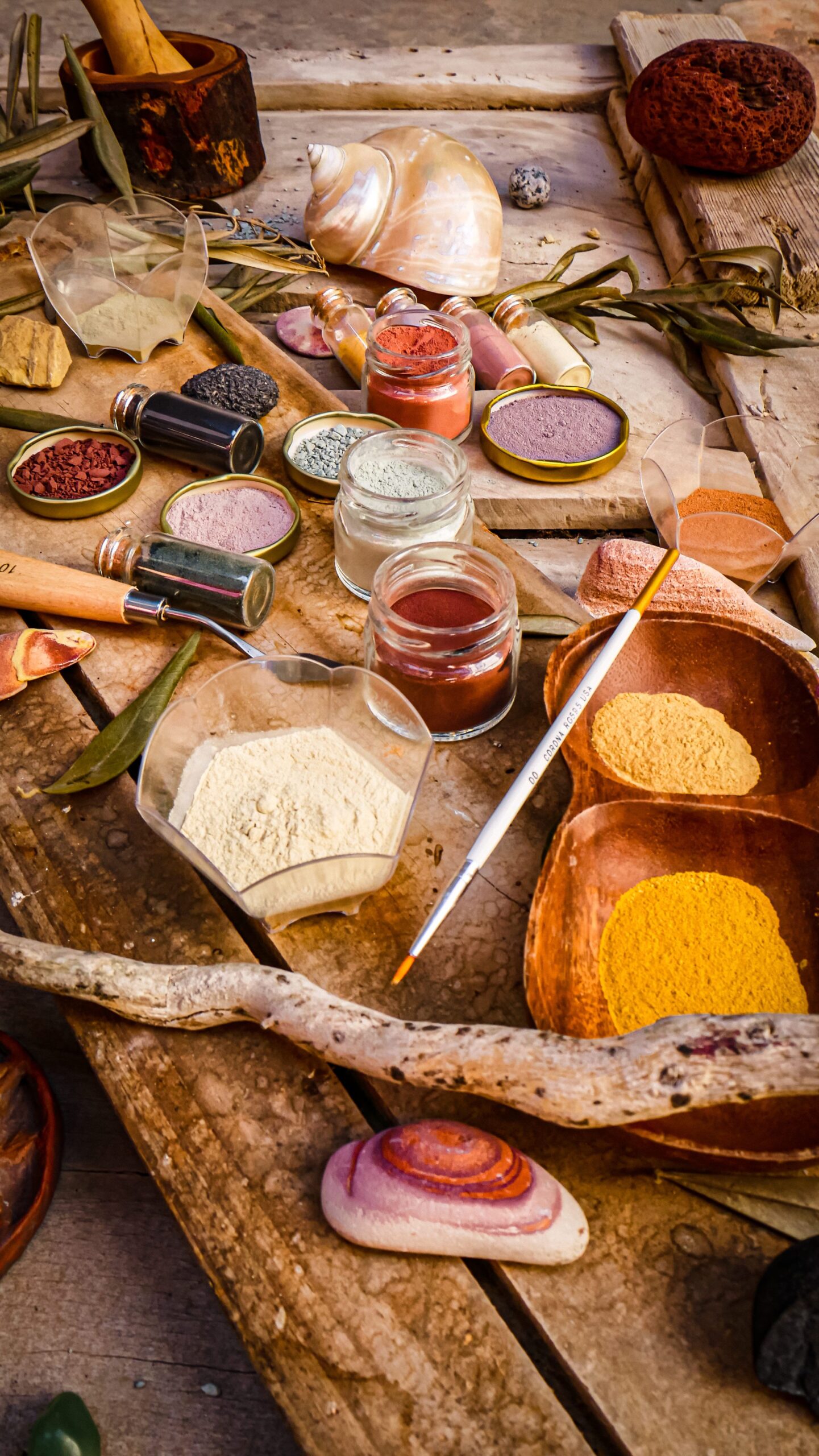 Colorful powders and natural materials arranged artistically in Cusco, Peru, capturing vibrant and earthy tones.